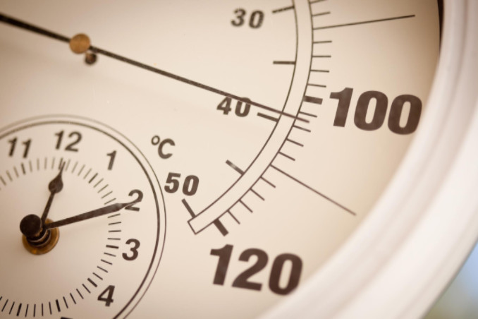 Thermometer reading 100 degrees: Gagne Residential Heating and Air Blog