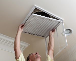 Changing air conditioner filter: Gagne Maintenance Blog
