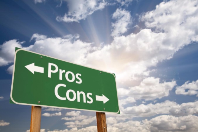 a green sign showing pros and cons